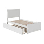 Letto a piattaforma con pediera coordinata e letto estraibile